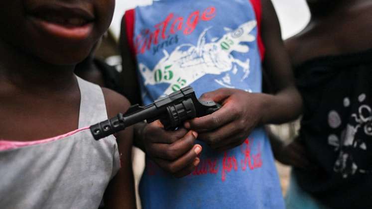 A los menores los arman las bandas. / Foto: AFP